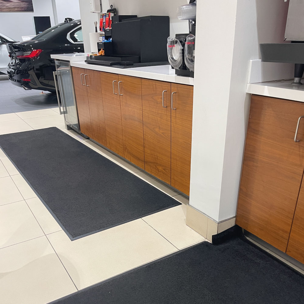 Office cleaning service performed in auto dealership.